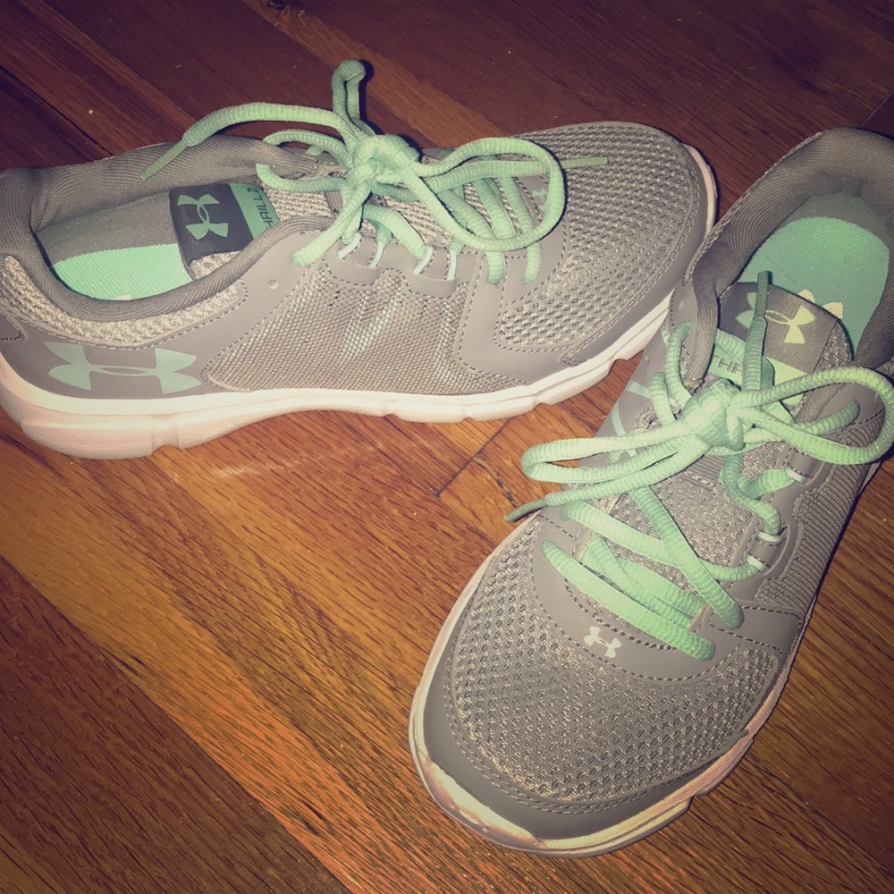 Under armor tennis shoes.